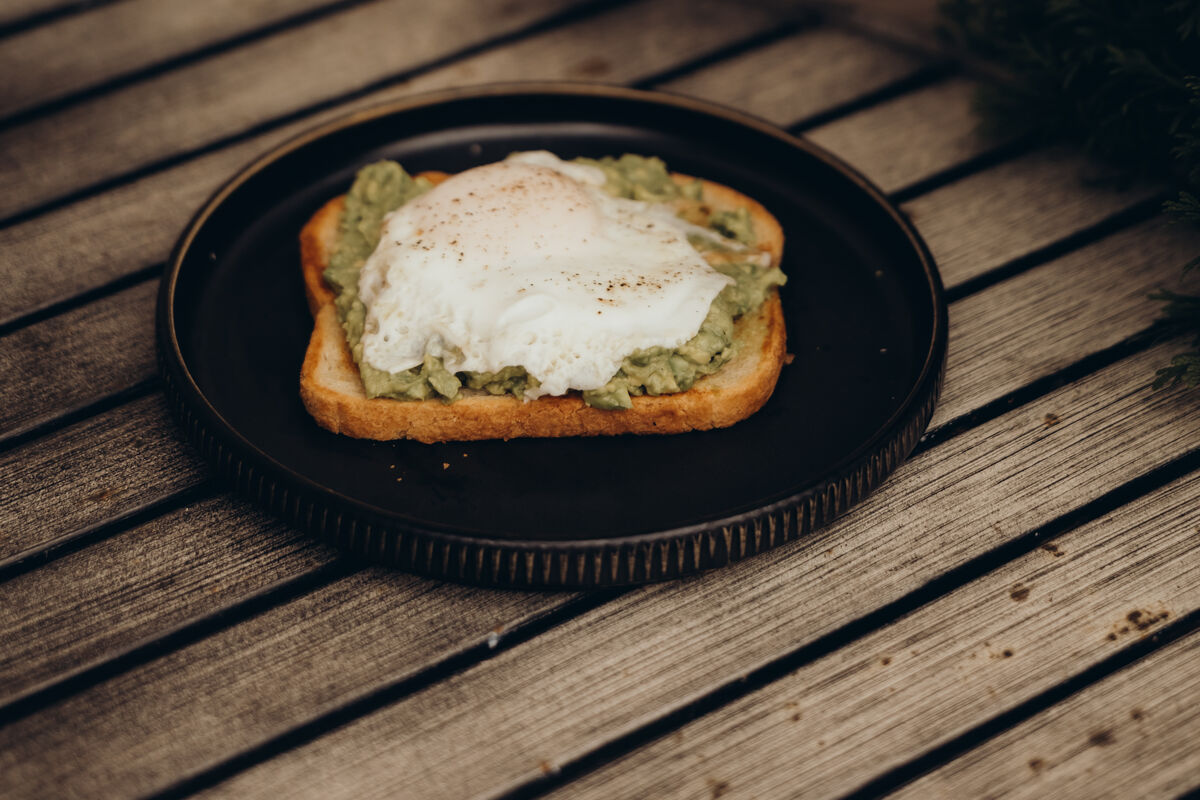Avocado toast with a fried egg